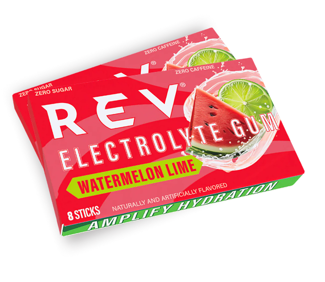 Green energy gum packaging with 'REV Energy Gum' text on a reflective surface.