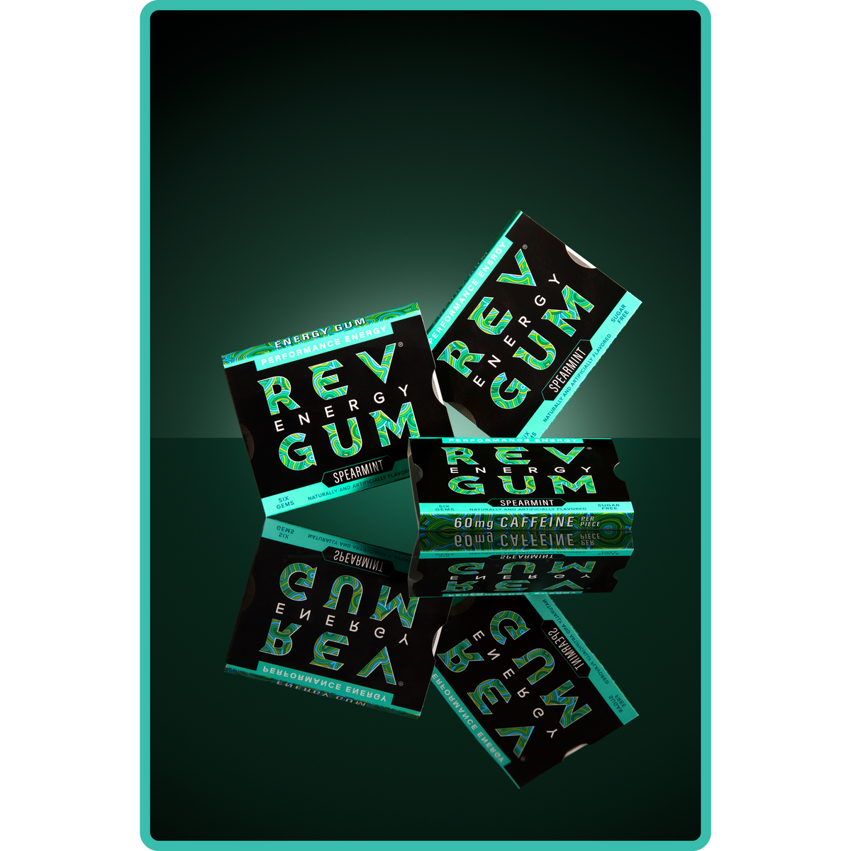 Green energy gum packaging with 'REV Energy Gum' text on a reflective surface.